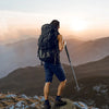 backpacker with Retractable Hiking Pole at Sunset-best hiking poles-collapsible hiking poles-adjustable hiking poles-
trekking poles-best trekking poles-
premium hiking poles-hiking poles for rough terrain-hiking poles for heavy hikers-hiking poles for backpacking-hiking poles with twist locks